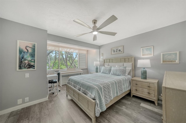 1740 Alderman St Unit 7, Sarasota, FL 34236 - bedroom featuring wood finished floors, ceiling fan, and an office area