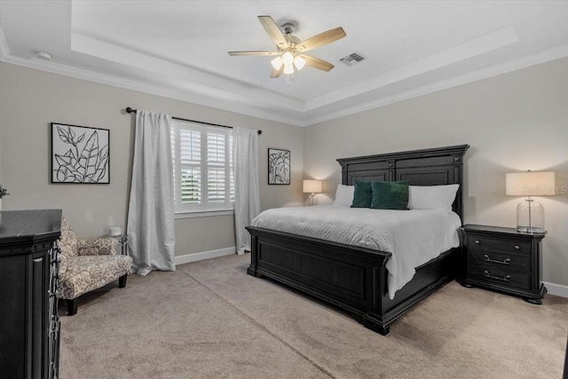 3344 Anchor Bay Trl, Bradenton, FL 34211 - bedroom with a raised ceiling, light carpet, ceiling fan, and crown molding