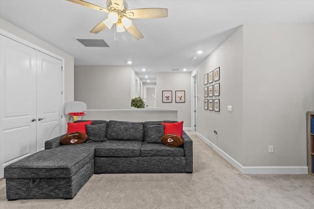 3344 Anchor Bay Trl, Bradenton, FL 34211 - living area featuring light carpet, ceiling fan, and recessed lighting