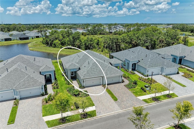 11685 Great Brook Ln, Parrish, FL 34219 - aerial perspective of suburban area with a large body of water