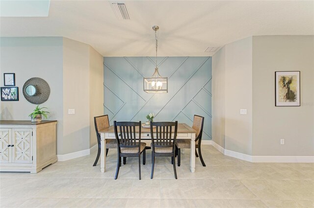 11685 Great Brook Ln, Parrish, FL 34219 - dining space with a chandelier and light tile patterned floors