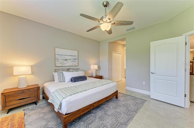 11685 Great Brook Ln, Parrish, FL 34219 - bedroom with light tile patterned floors, a closet, and a ceiling fan