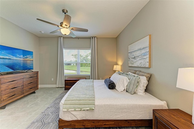 11685 Great Brook Ln, Parrish, FL 34219 - bedroom featuring light tile patterned floors and a ceiling fan