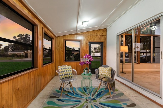 4232 Pandora Rd, Venice, FL 34293 - sunroom featuring tile patterned floors, lofted ceiling, and wooden walls