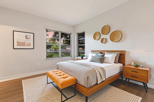 4232 Pandora Rd, Venice, FL 34293 - bedroom featuring baseboards and wood finished floors