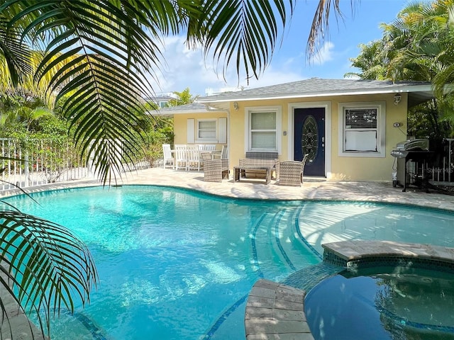 152 Coolidge Dr, Sarasota, FL 34236 - view of pool with a pool with connected hot tub, a grill, and a patio area