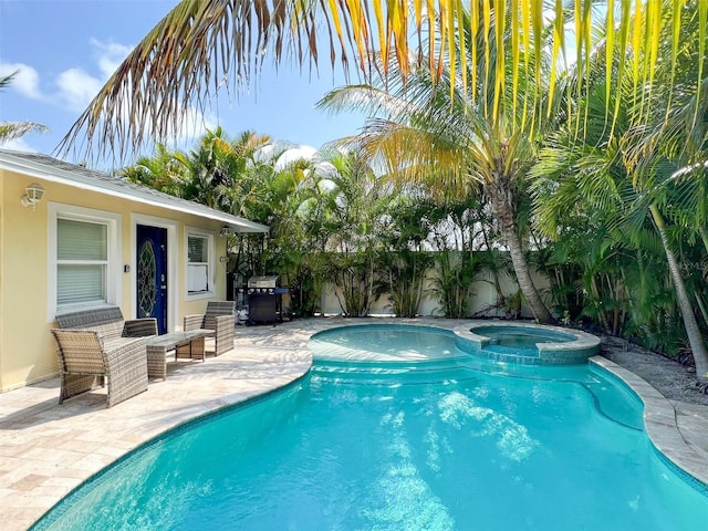 152 Coolidge Dr, Sarasota, FL 34236 - view of pool featuring a patio area, a fenced backyard, grilling area, and a pool with connected hot tub