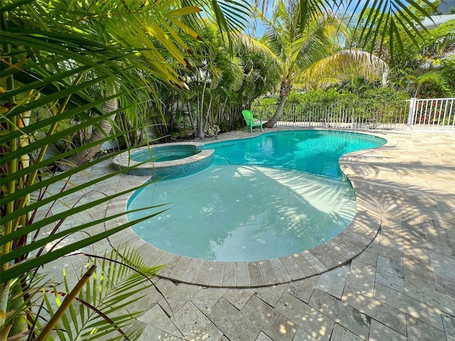 152 Coolidge Dr, Sarasota, FL 34236 - view of pool featuring a pool with connected hot tub and a patio area