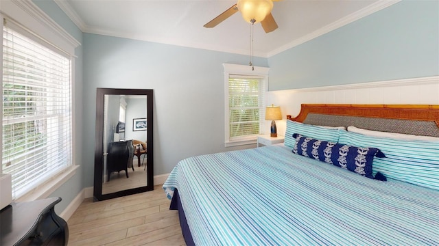 152 Coolidge Dr, Sarasota, FL 34236 - bedroom featuring light wood-type flooring, a ceiling fan, and ornamental molding