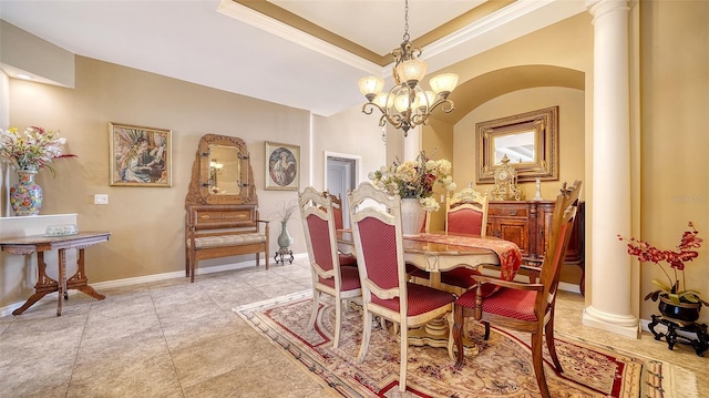 8183 Nice Way, Sarasota, FL 34238 - dining space featuring crown molding, a chandelier, arched walkways, a tray ceiling, and light tile patterned floors