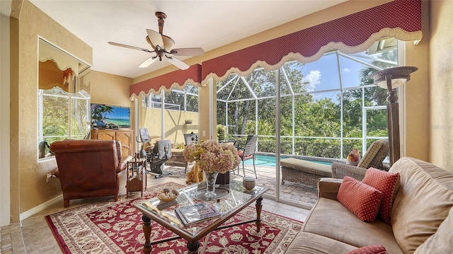 8183 Nice Way, Sarasota, FL 34238 - sunroom / solarium featuring healthy amount of natural light, ceiling fan, and an outdoor hangout area