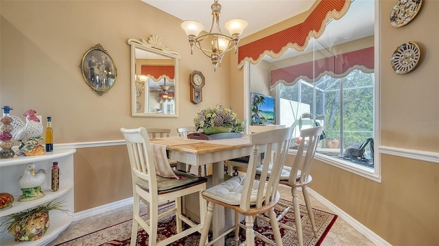 8183 Nice Way, Sarasota, FL 34238 - dining room featuring a chandelier and tile patterned flooring