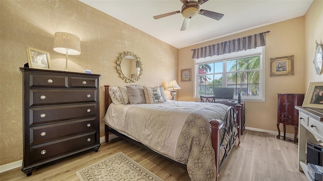 8183 Nice Way, Sarasota, FL 34238 - bedroom featuring light wood finished floors, vaulted ceiling, and ceiling fan