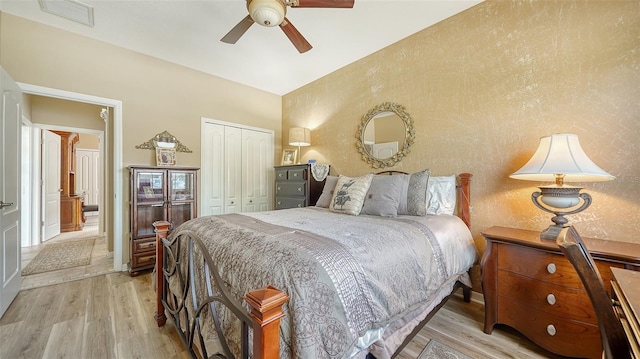 8183 Nice Way, Sarasota, FL 34238 - bedroom with light wood-style flooring, a closet, and ceiling fan