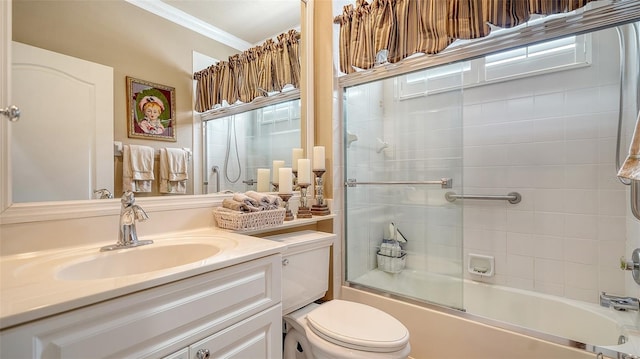 8183 Nice Way, Sarasota, FL 34238 - full bathroom featuring vanity, ornamental molding, and combined bath / shower with glass door