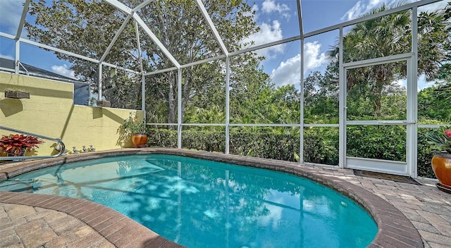 8183 Nice Way, Sarasota, FL 34238 - swimming pool with glass enclosure and a patio