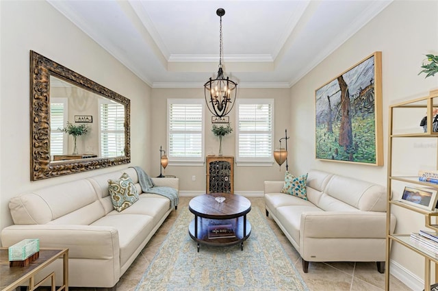 138 Toscavilla Blvd, Nokomis, FL 34275 - living room featuring a chandelier, a tray ceiling, tile patterned floors, and ornamental molding