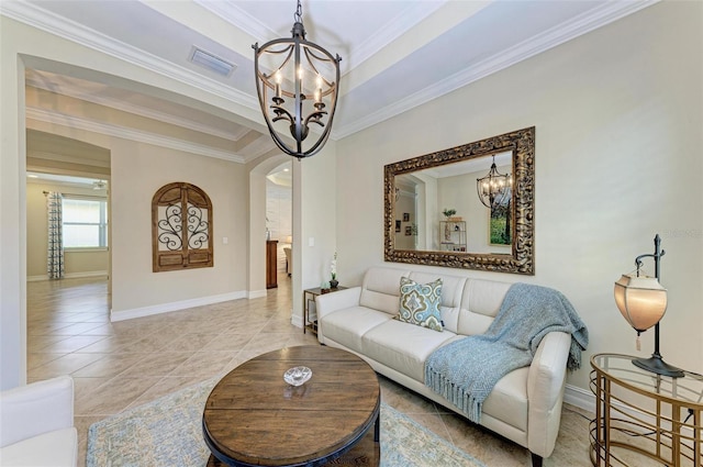 138 Toscavilla Blvd, Nokomis, FL 34275 - living area featuring a chandelier, arched walkways, crown molding, and tile patterned floors