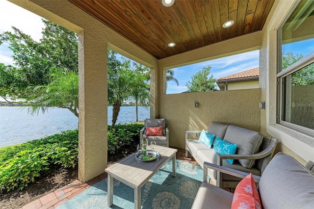138 Toscavilla Blvd, Nokomis, FL 34275 - view of patio featuring a water view and an outdoor hangout area