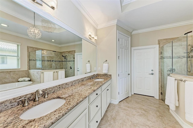 138 Toscavilla Blvd, Nokomis, FL 34275 - bathroom featuring a shower stall, double vanity, a chandelier, crown molding, and a garden tub