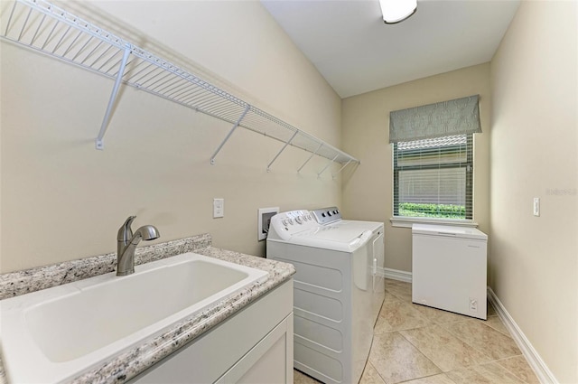 138 Toscavilla Blvd, Nokomis, FL 34275 - laundry area featuring washer and clothes dryer and light tile patterned flooring