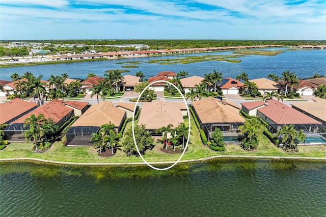 138 Toscavilla Blvd, Nokomis, FL 34275 - aerial perspective of suburban area with a large body of water