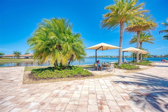 138 Toscavilla Blvd, Nokomis, FL 34275 - view of community with a water view and a patio
