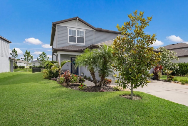 8985 Royal River Cir, Parrish, FL 34219 - view of front of house with a front lawn