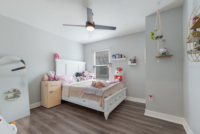 8985 Royal River Cir, Parrish, FL 34219 - bedroom featuring dark wood finished floors and ceiling fan