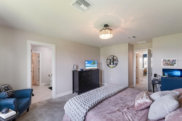 8985 Royal River Cir, Parrish, FL 34219 - carpeted bedroom with a chandelier and ensuite bathroom