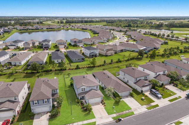 8985 Royal River Cir, Parrish, FL 34219 - aerial perspective of suburban area featuring a nearby body of water