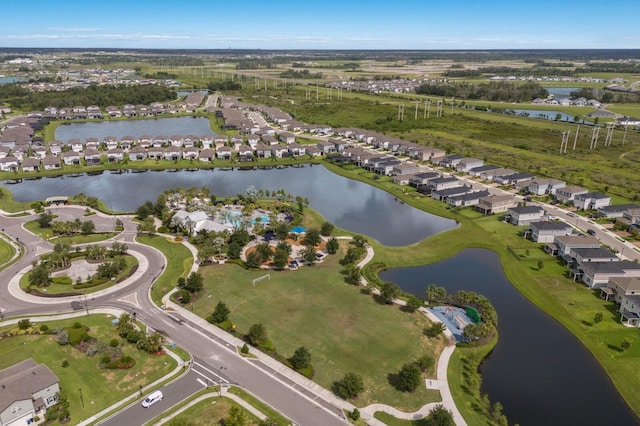 8985 Royal River Cir, Parrish, FL 34219 - aerial view of property and surrounding area with nearby suburban area and a large body of water