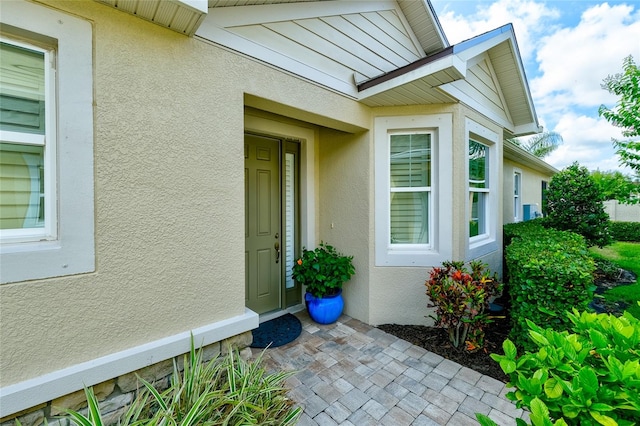 3681 Divot Ln, Sarasota, FL 34232 - property entrance with stucco siding