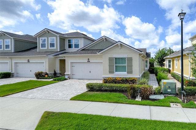 3681 Divot Ln, Sarasota, FL 34232 - view of front of home with decorative driveway and stucco siding