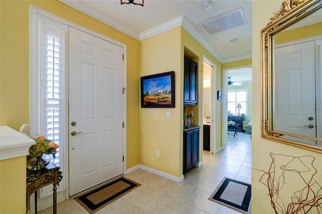 3681 Divot Ln, Sarasota, FL 34232 - foyer entrance with ornamental molding and light tile patterned floors
