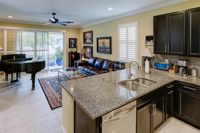 3681 Divot Ln, Sarasota, FL 34232 - kitchen featuring stainless steel dishwasher, a peninsula, a ceiling fan, open floor plan, and light stone counters