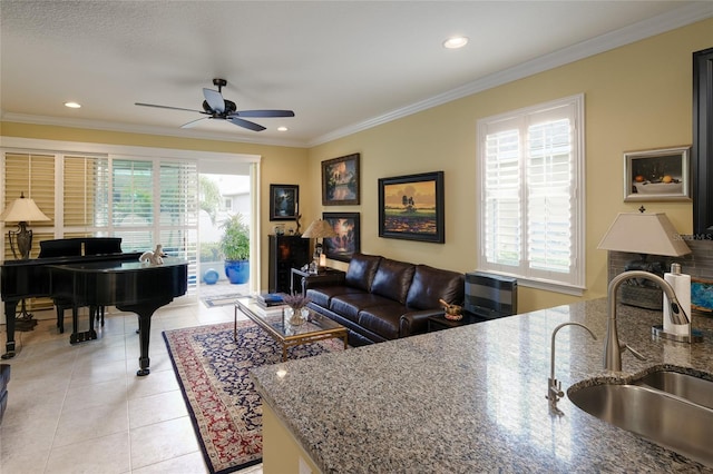3681 Divot Ln, Sarasota, FL 34232 - living area with a ceiling fan, ornamental molding, recessed lighting, and light tile patterned floors