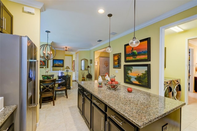 3681 Divot Ln, Sarasota, FL 34232 - kitchen with stainless steel refrigerator with ice dispenser, washer and dryer, a chandelier, crown molding, and light stone countertops