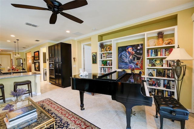 3681 Divot Ln, Sarasota, FL 34232 - sitting room featuring ornamental molding, ceiling fan, built in features, light tile patterned floors, and recessed lighting