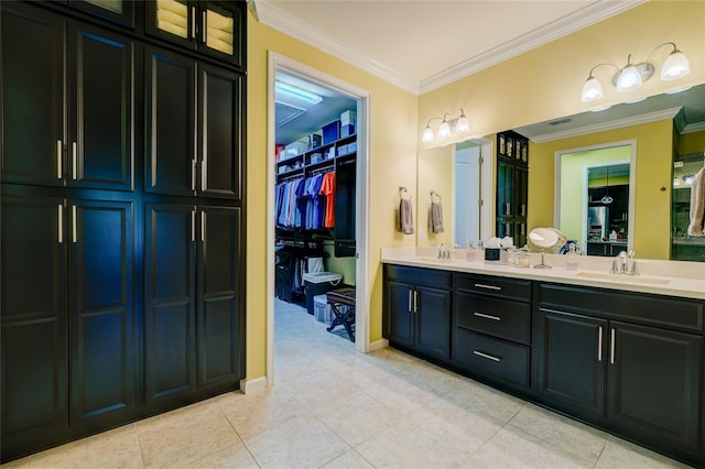 3681 Divot Ln, Sarasota, FL 34232 - full bath with crown molding, double vanity, tile patterned floors, and a spacious closet