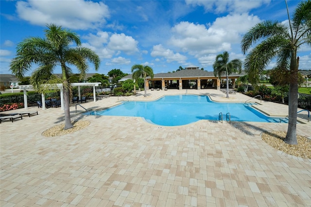 3681 Divot Ln, Sarasota, FL 34232 - community pool featuring a pergola and a patio area