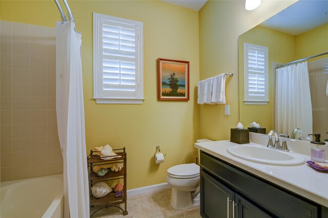 3681 Divot Ln, Sarasota, FL 34232 - bathroom with vanity, plenty of natural light, shower / bath combination with curtain, and tile patterned flooring
