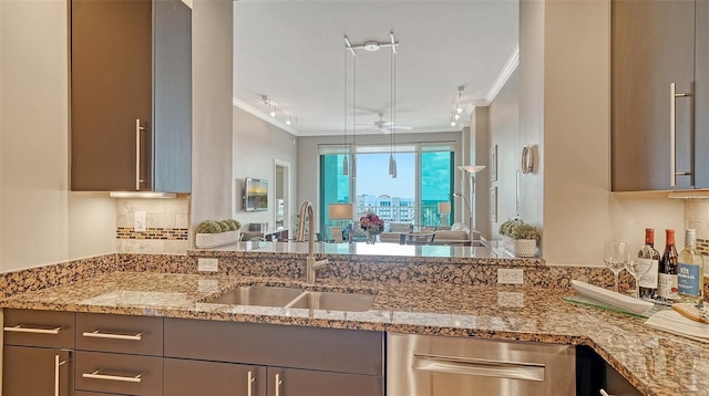 1771 Ringling Blvd Unit 1206, Sarasota, FL 34236 - kitchen with crown molding, stainless steel dishwasher, light stone counters, decorative backsplash, and ceiling fan