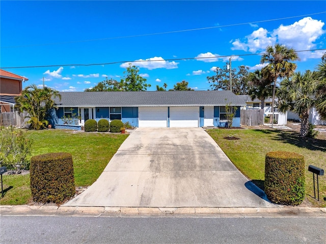 2131 Montclair Dr Unit 2131 & 2137, Sarasota, FL 34231 - single story home with a garage, concrete driveway, and a front yard