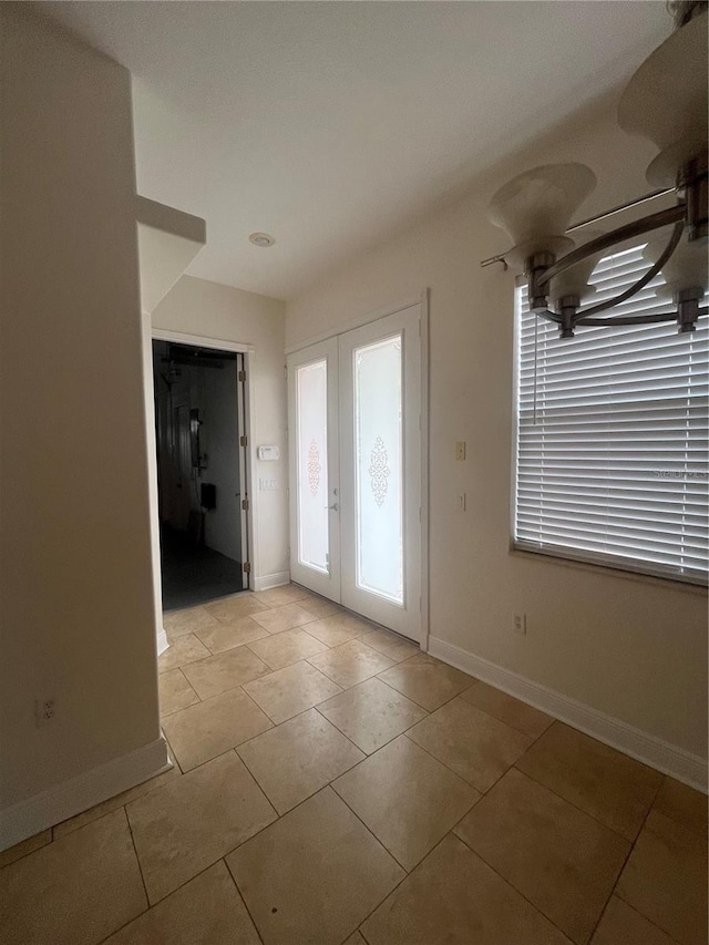 2119-2125 Montclair Dr Unit 2119 & 2125, Sarasota, FL 34231 - foyer entrance featuring french doors and light tile patterned flooring