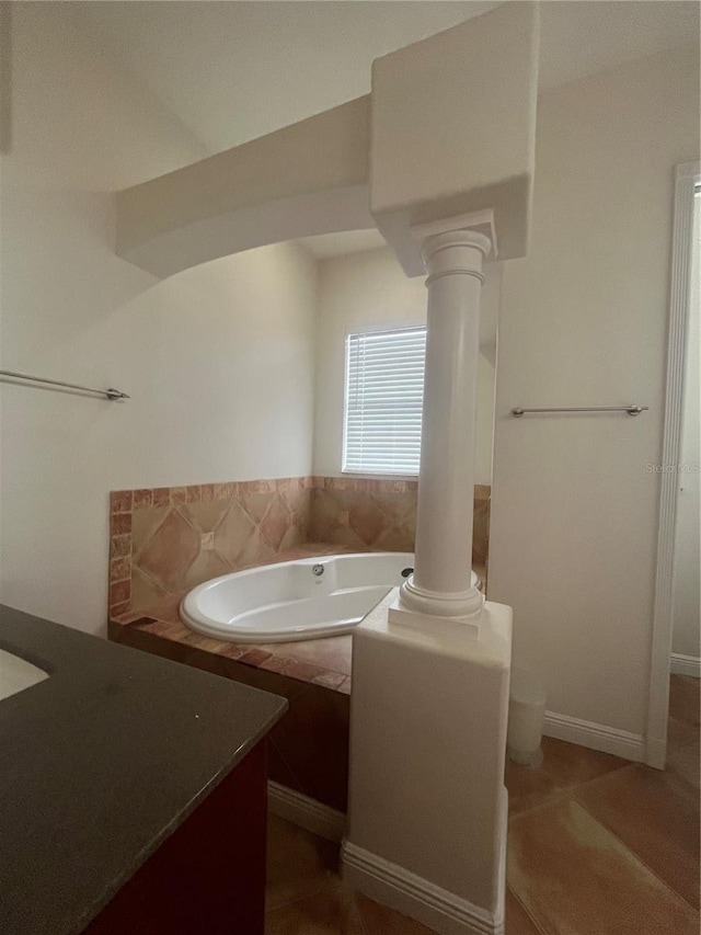 2119-2125 Montclair Dr Unit 2119 & 2125, Sarasota, FL 34231 - bathroom featuring decorative columns, vanity, a bath, and tile patterned floors
