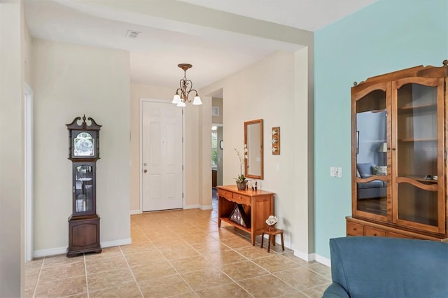 5333 Tide Point Way, Bradenton, FL 34208 - foyer with a chandelier and light tile patterned floors