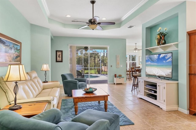 5333 Tide Point Way, Bradenton, FL 34208 - living area with ceiling fan, a raised ceiling, light tile patterned floors, ornamental molding, and recessed lighting