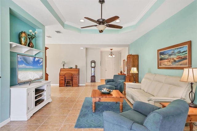 5333 Tide Point Way, Bradenton, FL 34208 - living area with a ceiling fan, a raised ceiling, light tile patterned floors, recessed lighting, and crown molding