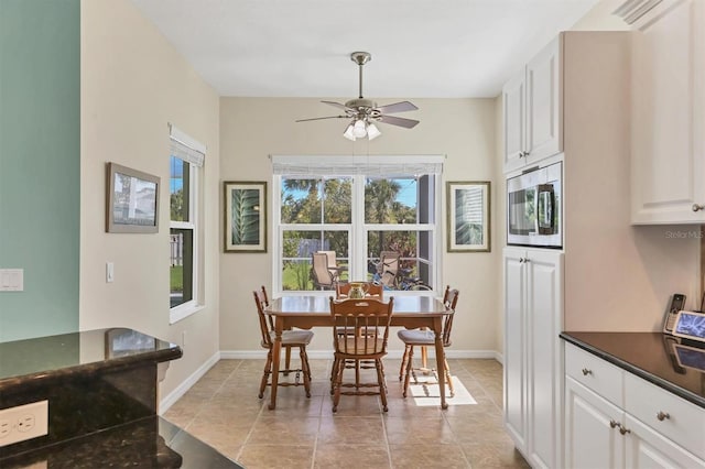 5333 Tide Point Way, Bradenton, FL 34208 - dining space featuring a ceiling fan and light tile patterned floors